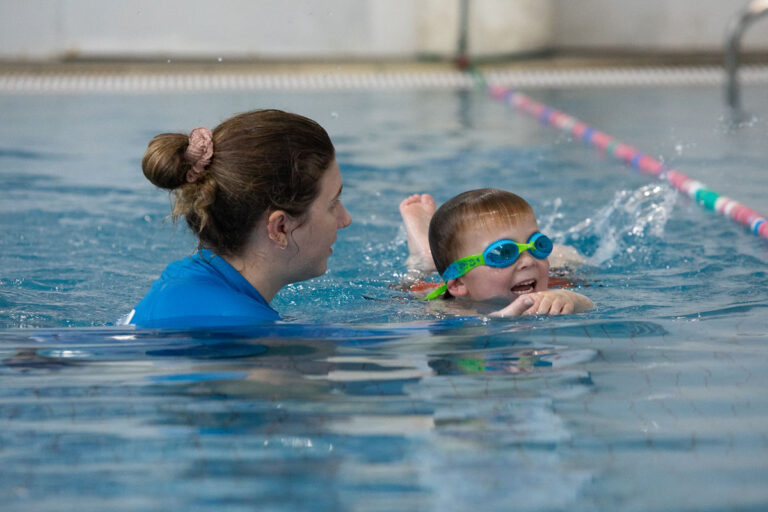 Child swimming at learn to swim school, Wodonga Leisure