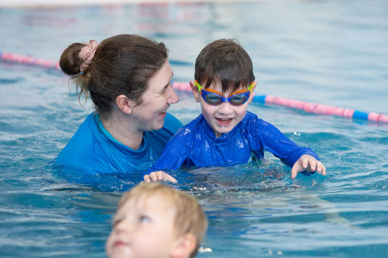 Child swimming at learn to swim school, Wodonga Leisure